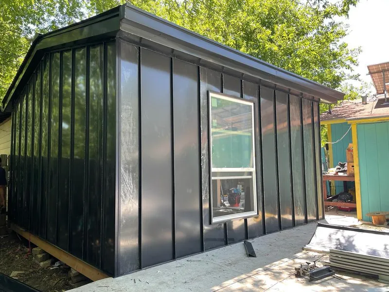 Black standing seam metal wall panels for Roof Inspection in Worthington