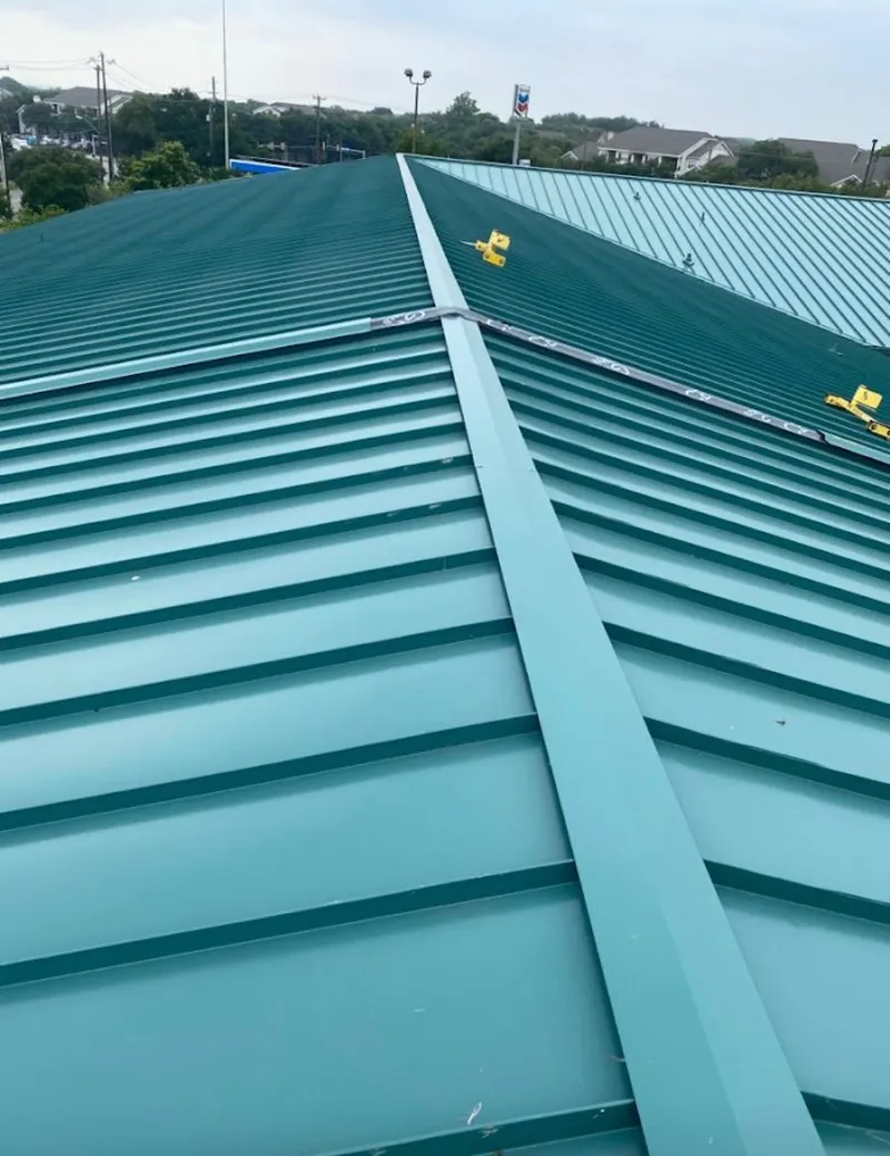 Green commercial metal roof ridge and valley for Metal Roof Repair in Worthington